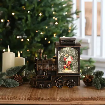 24cm Battery Operated Lit Santa in Train Magical Christmas Water Spinner